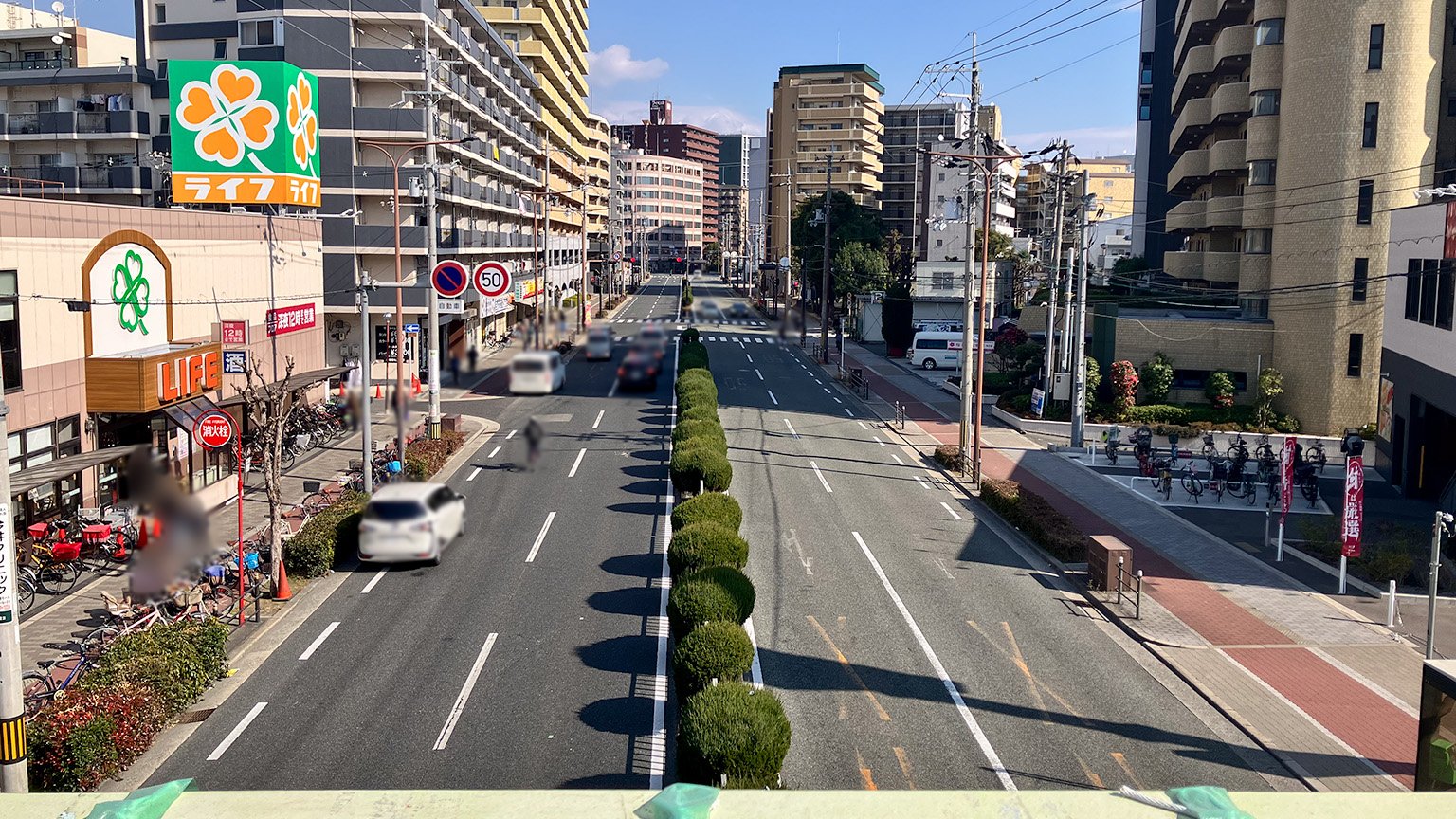 淀川通に架かる木川南歩道橋からの景色の写真